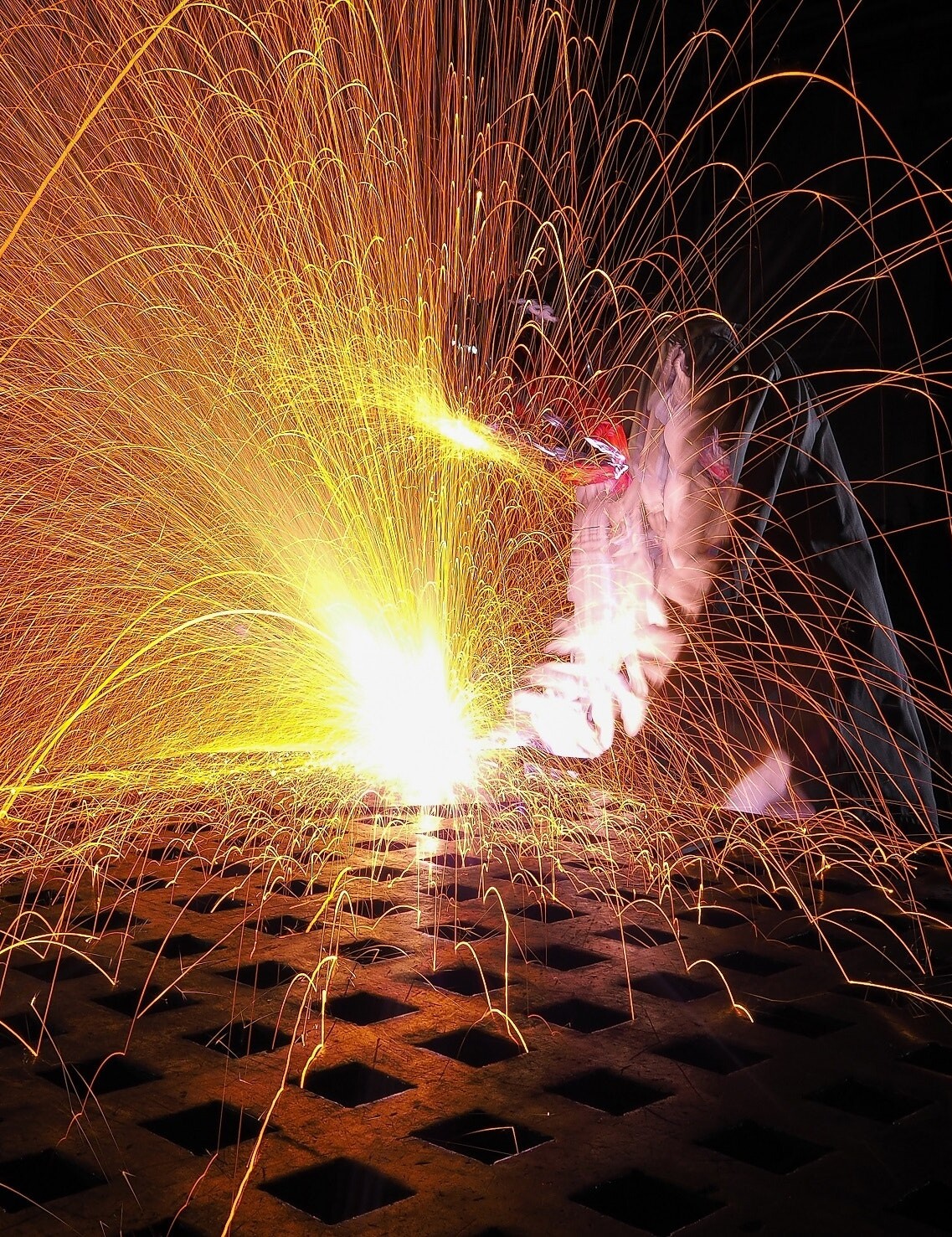 sparks flying from welding